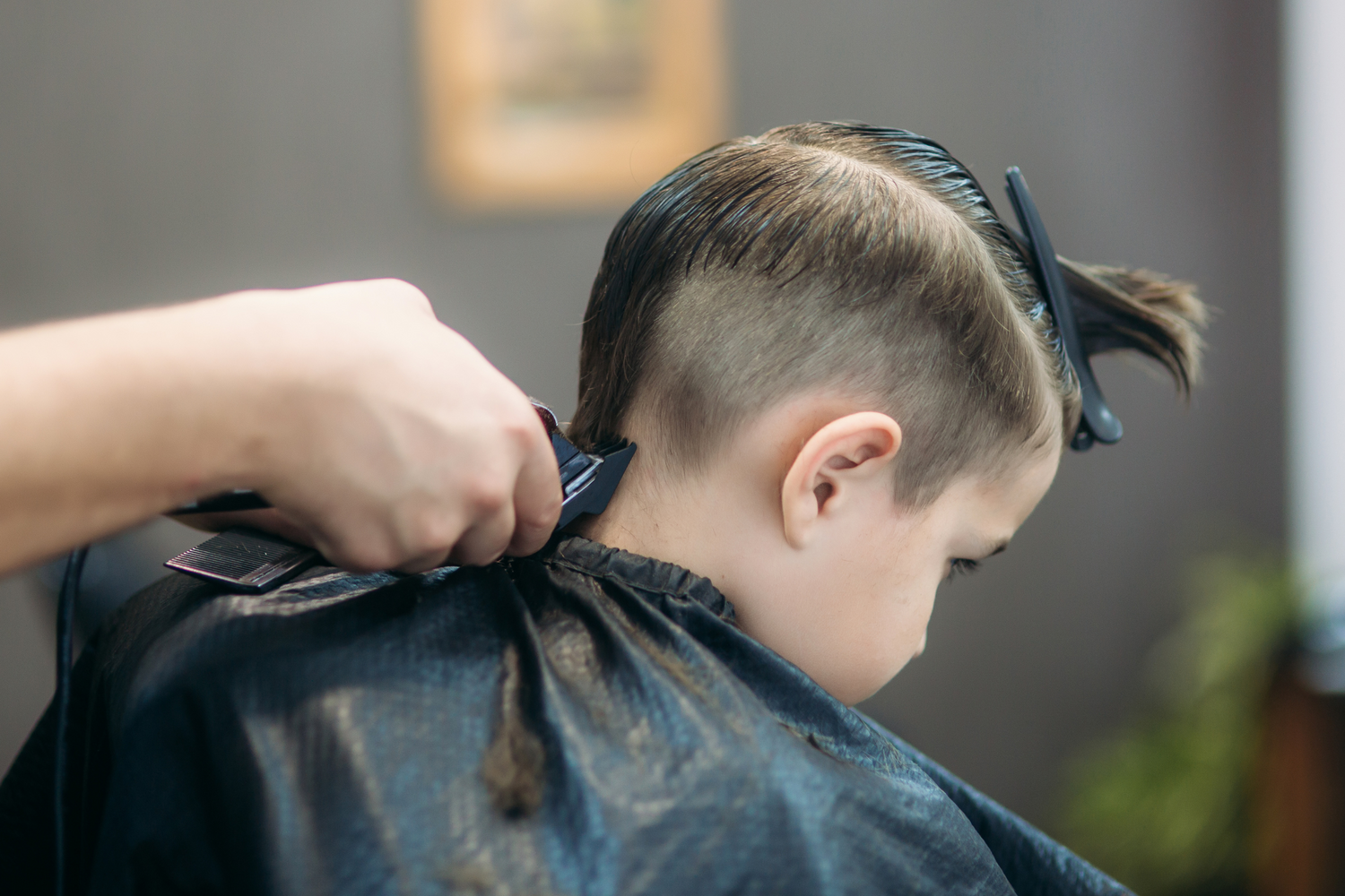 Professional kid's haircut service for a flawless and stylish look in Boerne TX at Brilliant Gems Hair Studio
